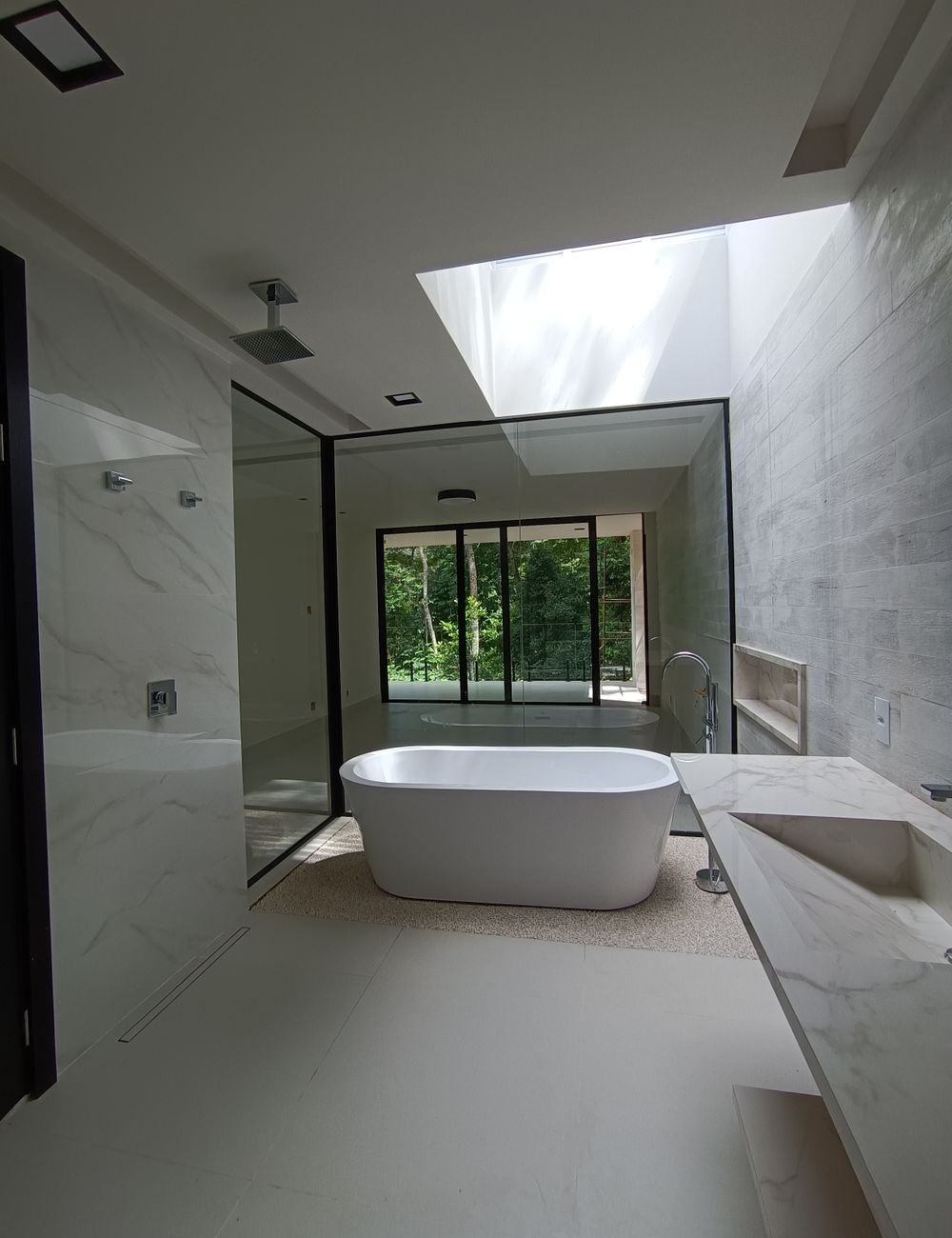 Modern bathroom with a glazed window and soft, diffused natural light